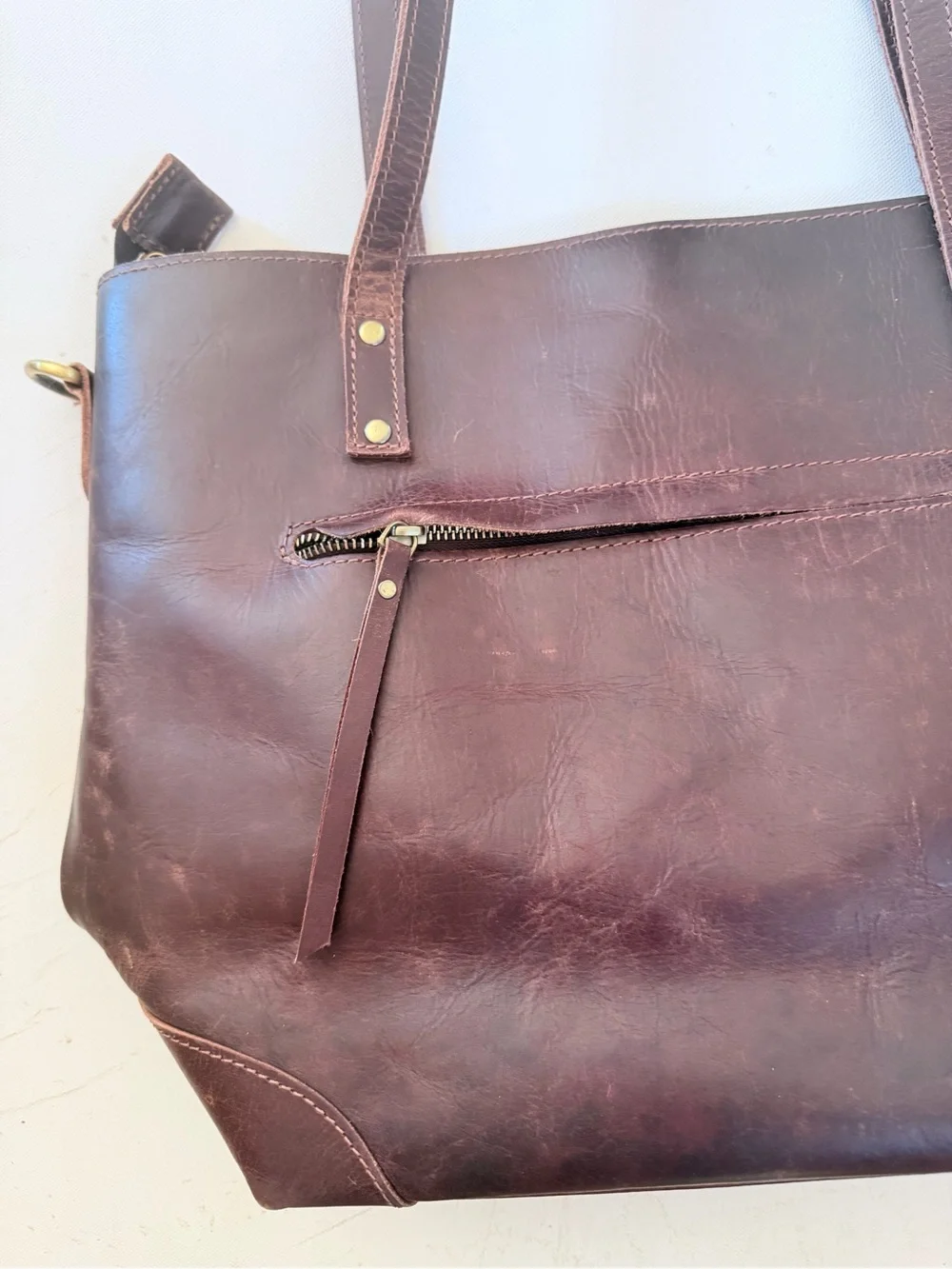 Brown leather messenger bag